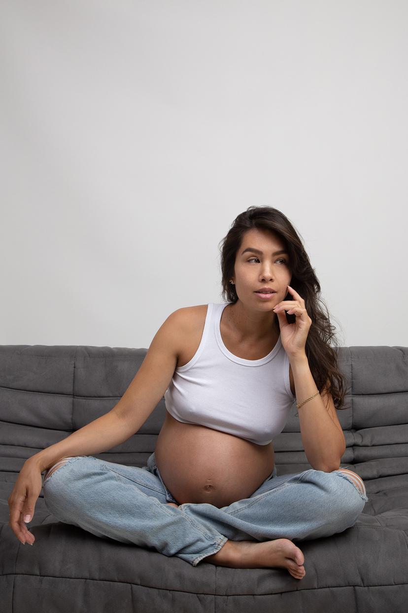 Linda maternity picture on the sofa